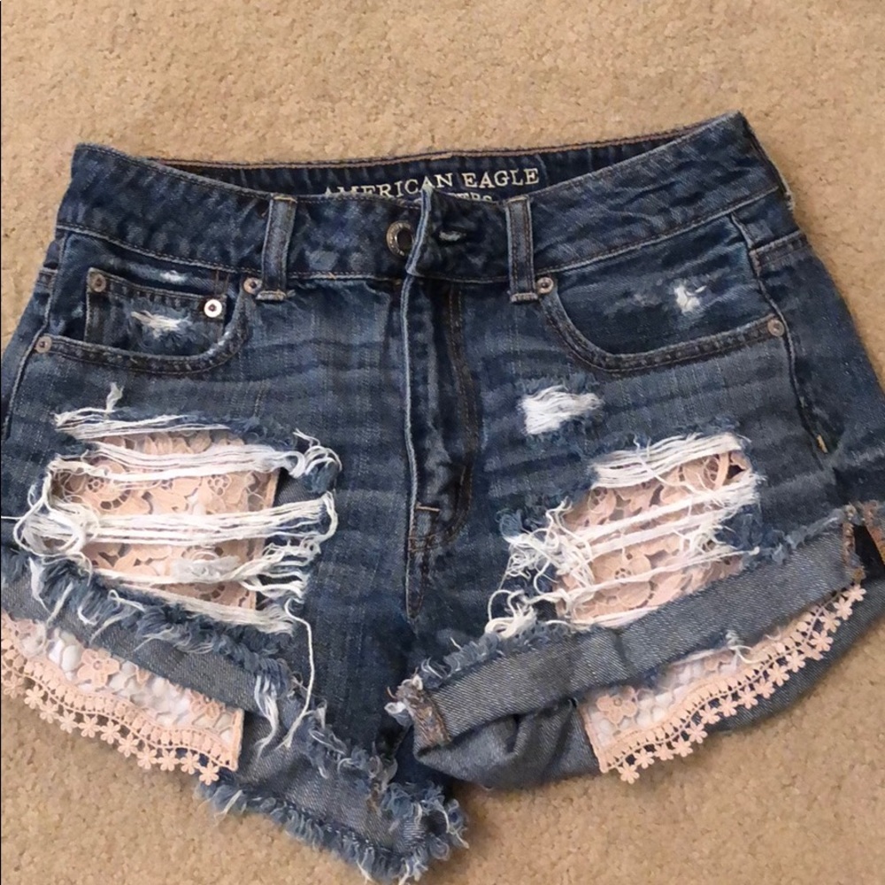 Festival high rise jean shorts with lace pockets
